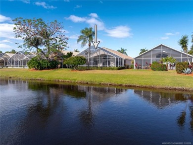 Ballantrae Pool Home with NEW ROOF, custom kitchen, new flooring on Santa Lucia River Club in Florida - for sale on GolfHomes.com, golf home, golf lot