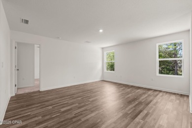 Tucked into a peaceful, wooded setting with no neighbors to the on Sunny Hills Golf and Country Club in Florida - for sale on GolfHomes.com, golf home, golf lot