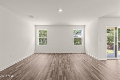 Tucked into a peaceful, wooded setting with no neighbors to the on Sunny Hills Golf and Country Club in Florida - for sale on GolfHomes.com, golf home, golf lot