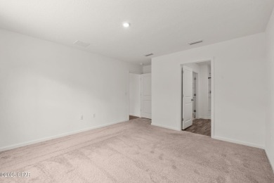 Tucked into a peaceful, wooded setting with no neighbors to the on Sunny Hills Golf and Country Club in Florida - for sale on GolfHomes.com, golf home, golf lot