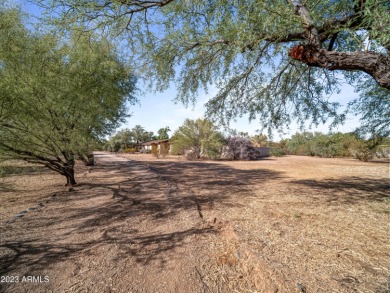 This lot has an existing 2,957sf house (original condition) plus on Gainey Ranch Golf Club in Arizona - for sale on GolfHomes.com, golf home, golf lot