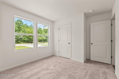 Tucked into a peaceful, wooded setting with no neighbors to the on Sunny Hills Golf and Country Club in Florida - for sale on GolfHomes.com, golf home, golf lot
