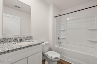 Tucked into a peaceful, wooded setting with no neighbors to the on Sunny Hills Golf and Country Club in Florida - for sale on GolfHomes.com, golf home, golf lot