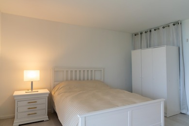 This spacious ocean end unit offers direct ocean views from its on Jupiter Dunes Golf Course in Florida - for sale on GolfHomes.com, golf home, golf lot