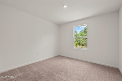 Tucked into a peaceful, wooded setting with no neighbors to the on Sunny Hills Golf and Country Club in Florida - for sale on GolfHomes.com, golf home, golf lot