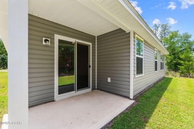 Tucked into a peaceful, wooded setting with no neighbors to the on Sunny Hills Golf and Country Club in Florida - for sale on GolfHomes.com, golf home, golf lot