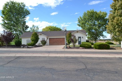 Located just off the 4th green of the Snowflake golf course on Snowflake Municipal Golf Course in Arizona - for sale on GolfHomes.com, golf home, golf lot