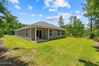 Tucked into a peaceful, wooded setting with no neighbors to the on Sunny Hills Golf and Country Club in Florida - for sale on GolfHomes.com, golf home, golf lot
