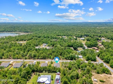Tucked into a peaceful, wooded setting with no neighbors to the on Sunny Hills Golf and Country Club in Florida - for sale on GolfHomes.com, golf home, golf lot