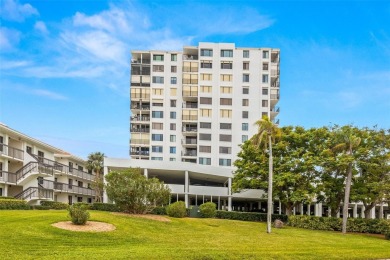 Live the Florida dream in your new move-in ready corner unit on Isla Del Sol Yacht and Country Club in Florida - for sale on GolfHomes.com, golf home, golf lot
