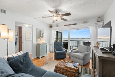 Live the Florida dream in your new move-in ready corner unit on Isla Del Sol Yacht and Country Club in Florida - for sale on GolfHomes.com, golf home, golf lot