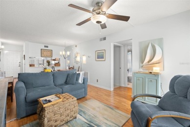 Live the Florida dream in your new move-in ready corner unit on Isla Del Sol Yacht and Country Club in Florida - for sale on GolfHomes.com, golf home, golf lot