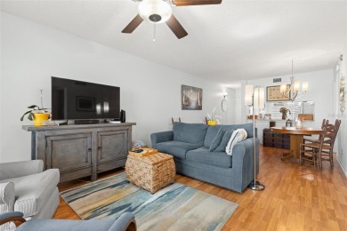 Live the Florida dream in your new move-in ready corner unit on Isla Del Sol Yacht and Country Club in Florida - for sale on GolfHomes.com, golf home, golf lot