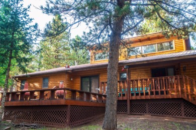 Beautiful getaway in Angel Fire only 1.7 mi from the ski base on Angel Fire Resort Country Club in New Mexico - for sale on GolfHomes.com, golf home, golf lot