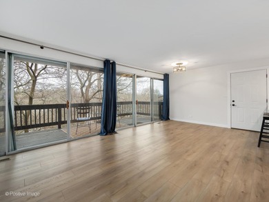 Freshly renovated second-floor lakefront unit offering the on River Bend Golf Club in Illinois - for sale on GolfHomes.com, golf home, golf lot