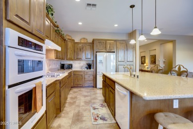 Enjoy this semi-custom TW Lewis turnkey home in one of Gilbert's on Seville Golf and Country Club in Arizona - for sale on GolfHomes.com, golf home, golf lot
