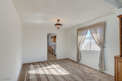 Welcome home! This single-story, pool home in Boulder City is on Boulder City Municipal Golf Course in Nevada - for sale on GolfHomes.com, golf home, golf lot