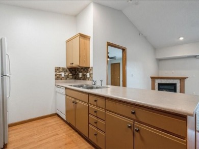 Welcome to easy living in this bright and airy 2-bedroom, 2-bath on St. Andrews Golf Club in Iowa - for sale on GolfHomes.com, golf home, golf lot