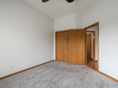 Welcome to easy living in this bright and airy 2-bedroom, 2-bath on St. Andrews Golf Club in Iowa - for sale on GolfHomes.com, golf home, golf lot