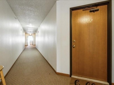Welcome to easy living in this bright and airy 2-bedroom, 2-bath on St. Andrews Golf Club in Iowa - for sale on GolfHomes.com, golf home, golf lot