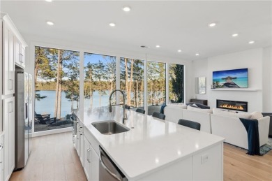 Modern Lakefront Luxury with Breathtaking Views!
If you've on The Highlands Course at Lake Arrowhead in Georgia - for sale on GolfHomes.com, golf home, golf lot