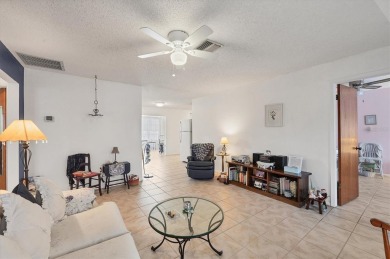Discover your Florida dream home in the heart of Englewood! This on Oyster Creek Golf Club in Florida - for sale on GolfHomes.com, golf home, golf lot