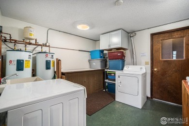 Set against the backdrop of Estes Park's natural beauty, this on Estes Park Golf Course in Colorado - for sale on GolfHomes.com, golf home, golf lot