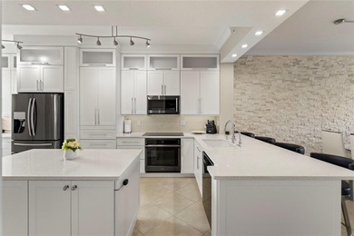 Move right into this elegantly remodeled residence. High quality on Palm-Aire Country Club and Resort - The Oaks in Florida - for sale on GolfHomes.com, golf home, golf lot