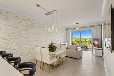 Move right into this elegantly remodeled residence. High quality on Palm-Aire Country Club and Resort - The Oaks in Florida - for sale on GolfHomes.com, golf home, golf lot