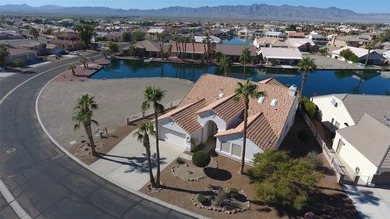 This home is located in the prestigious gated community of Los on Los Lagos Golf Club in Arizona - for sale on GolfHomes.com, golf home, golf lot