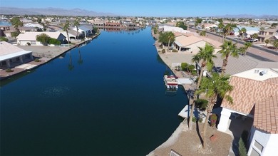 This home is located in the prestigious gated community of Los on Los Lagos Golf Club in Arizona - for sale on GolfHomes.com, golf home, golf lot