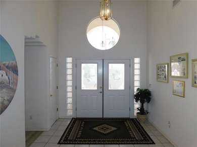 This home is located in the prestigious gated community of Los on Los Lagos Golf Club in Arizona - for sale on GolfHomes.com, golf home, golf lot