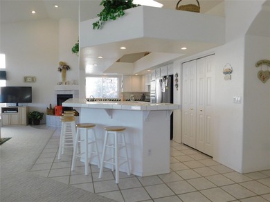 This home is located in the prestigious gated community of Los on Los Lagos Golf Club in Arizona - for sale on GolfHomes.com, golf home, golf lot