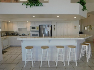 This home is located in the prestigious gated community of Los on Los Lagos Golf Club in Arizona - for sale on GolfHomes.com, golf home, golf lot