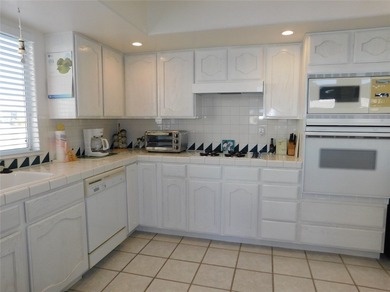 This home is located in the prestigious gated community of Los on Los Lagos Golf Club in Arizona - for sale on GolfHomes.com, golf home, golf lot