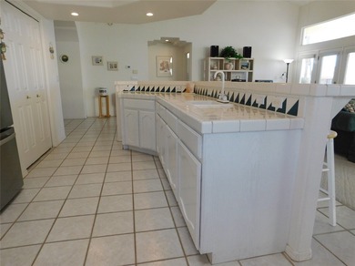 This home is located in the prestigious gated community of Los on Los Lagos Golf Club in Arizona - for sale on GolfHomes.com, golf home, golf lot