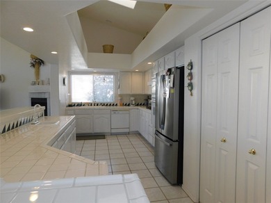 This home is located in the prestigious gated community of Los on Los Lagos Golf Club in Arizona - for sale on GolfHomes.com, golf home, golf lot