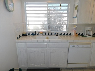 This home is located in the prestigious gated community of Los on Los Lagos Golf Club in Arizona - for sale on GolfHomes.com, golf home, golf lot