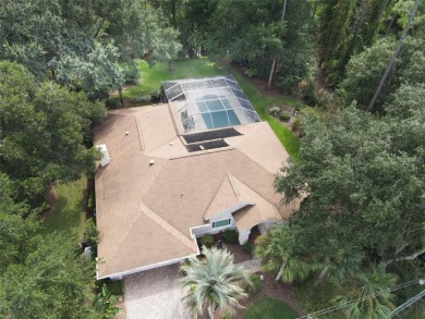 Under contract-accepting backup offers. Stunning Estate-Style on The Grand Club Cypress Course in Florida - for sale on GolfHomes.com, golf home, golf lot