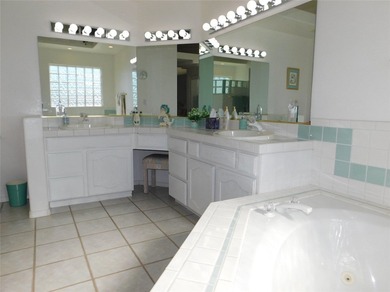 This home is located in the prestigious gated community of Los on Los Lagos Golf Club in Arizona - for sale on GolfHomes.com, golf home, golf lot