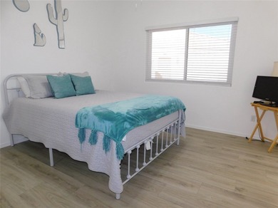 This home is located in the prestigious gated community of Los on Los Lagos Golf Club in Arizona - for sale on GolfHomes.com, golf home, golf lot