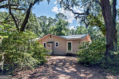 Nestled in the heart of Shellman Bluff, this two bedroom/two on Sapelo Hammock Golf Club in Georgia - for sale on GolfHomes.com, golf home, golf lot