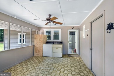 Nestled in the heart of Shellman Bluff, this two bedroom/two on Sapelo Hammock Golf Club in Georgia - for sale on GolfHomes.com, golf home, golf lot