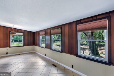 Nestled in the heart of Shellman Bluff, this two bedroom/two on Sapelo Hammock Golf Club in Georgia - for sale on GolfHomes.com, golf home, golf lot