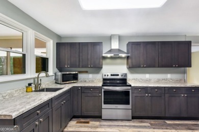 Nestled in the heart of Shellman Bluff, this two bedroom/two on Sapelo Hammock Golf Club in Georgia - for sale on GolfHomes.com, golf home, golf lot