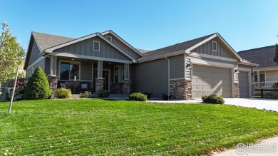 Experience the best of both worlds: watch golfers tee off across on Highland Meadows Golf Course in Colorado - for sale on GolfHomes.com, golf home, golf lot