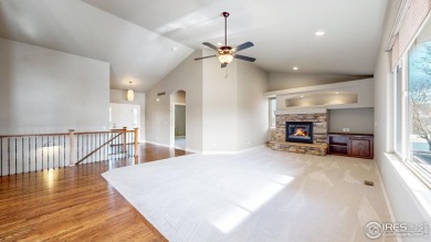 Experience the best of both worlds: watch golfers tee off across on Highland Meadows Golf Course in Colorado - for sale on GolfHomes.com, golf home, golf lot