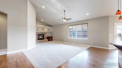 Experience the best of both worlds: watch golfers tee off across on Highland Meadows Golf Course in Colorado - for sale on GolfHomes.com, golf home, golf lot