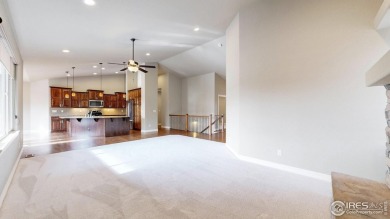 Experience the best of both worlds: watch golfers tee off across on Highland Meadows Golf Course in Colorado - for sale on GolfHomes.com, golf home, golf lot