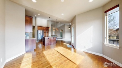 Experience the best of both worlds: watch golfers tee off across on Highland Meadows Golf Course in Colorado - for sale on GolfHomes.com, golf home, golf lot